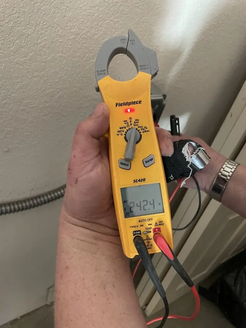 Voltage testing with clamp meter during Generator Installation in Newfane